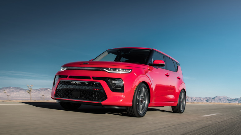Front 3/4 of red 2020 Kia Soul GT-Line driving on road