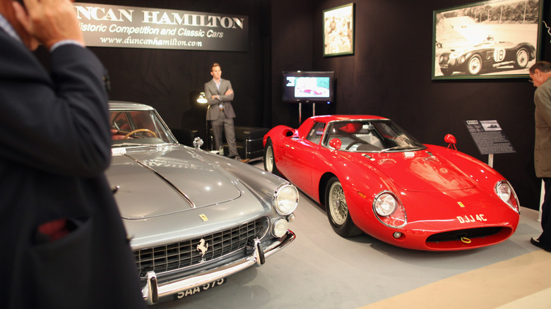 A Ferrari a a showroom for classic cars
