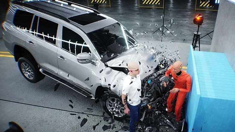 A frontal crash test into a fixed barrier.