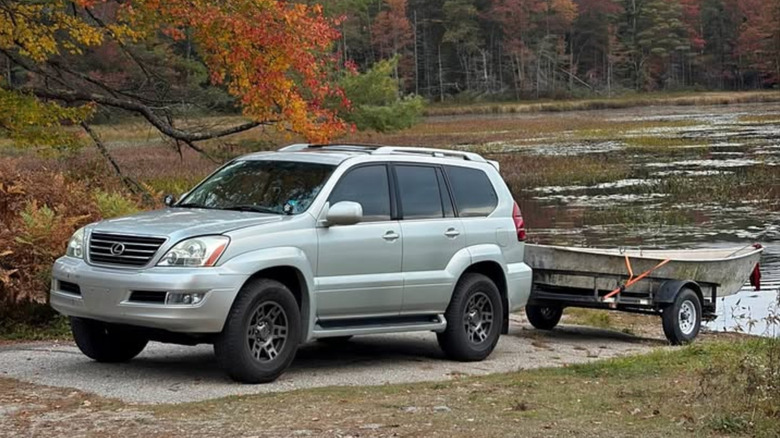 Silver Lexus GX470 towing a trailer