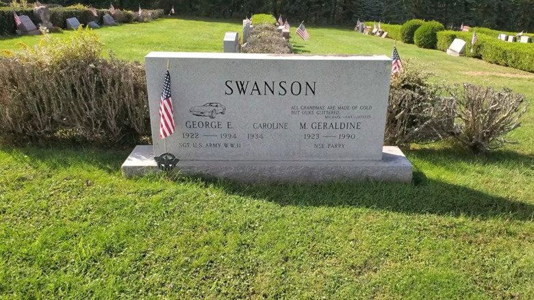 Headstone for George Swanson (and his wife) showing engraved Chevrolet Corvette.