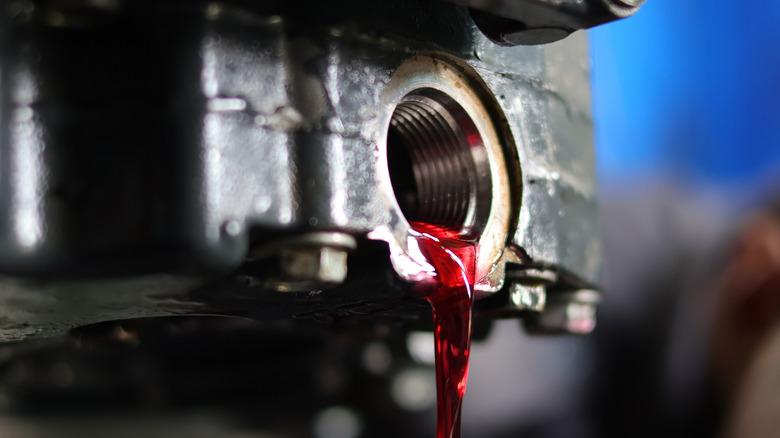 Draining the old ATF from an automatic transmission