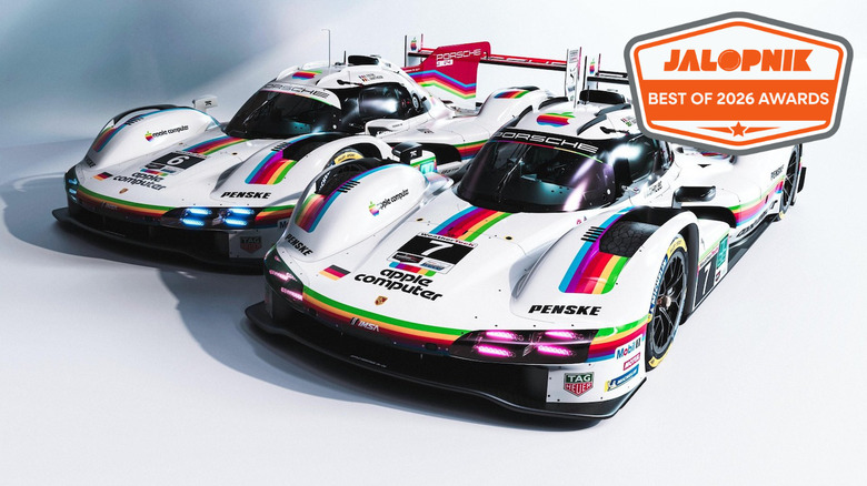 Two Porsche race cars in Apple Computer Penske Porsche 963 livery