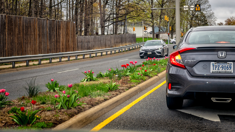 A car waiting to turn left