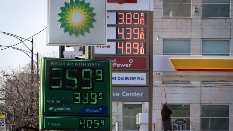 Signs display prices for gasoline at stations on March 02, 2026 in Chicago, Illinois.