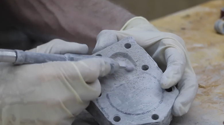 Grinding a J-B Weld cylinder head