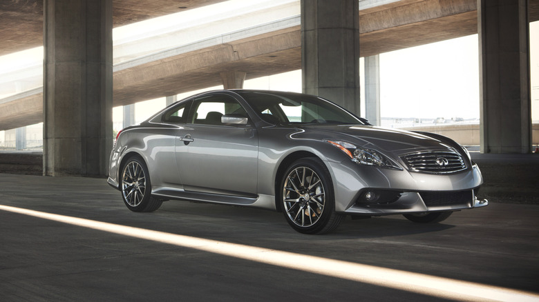 A dark silver 2013 Infiniti IPL G Coupe in a parking garage