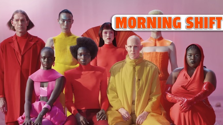 models in bright clothes sit and stare at the camera. Jalopnik's 