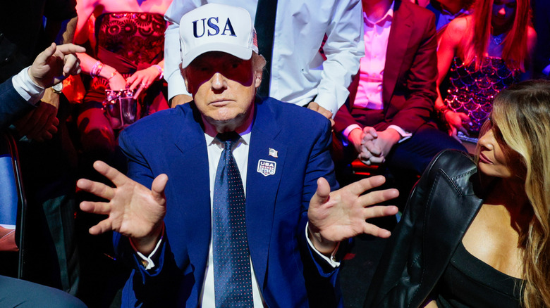 Donald Trump attending his birthday party in 2026. First Lady Melania Trump is at right.