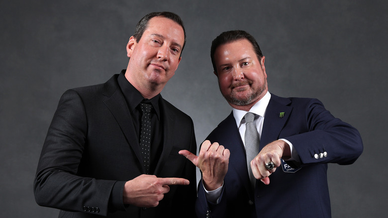 NASCAR Hall of Fame inductee Kurt Busch (R) and his brother, NASCAR Cup Series driver, Kyle Busch pose for photos at the NASCAR Hall of Fame Induction Ceremony at Charlotte Convention Center on January 23, 2026 in Charlotte, North Carolina.