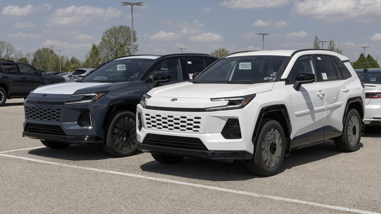 Toyota RAV4 Plug-In Hybrid AWD SUV at a dealership.