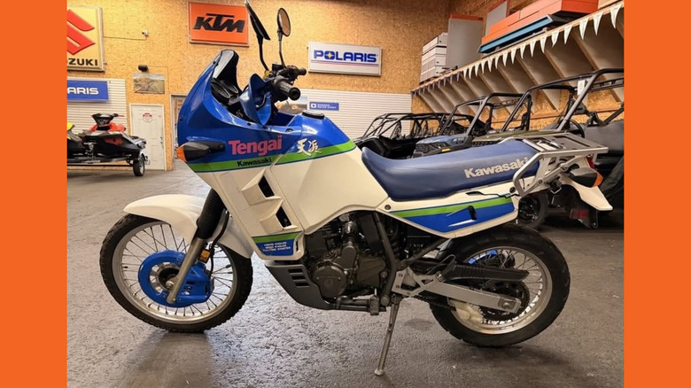 A blue, white, and green KLR650