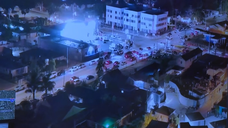 A screenshot of footage from Fox 11 recording the LAPD's live drone footage above the gathering street takeover.