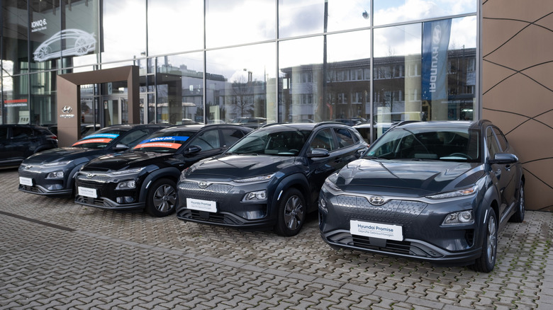modern electric Hyundai Kona cars parked outside dealership. New vehicle South Korean automobile manufacturer on display. Automotive industry, EV in Europe, Frankfurt - December 13, 2023