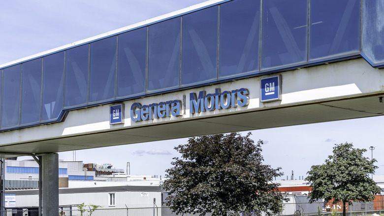 Oshawa, Ontario, Canada - July 01, 2019: Sign Of General Motors on the bridge at the GM Oshawa Car Assembly facility in Oshawa, Ontario, Canada.