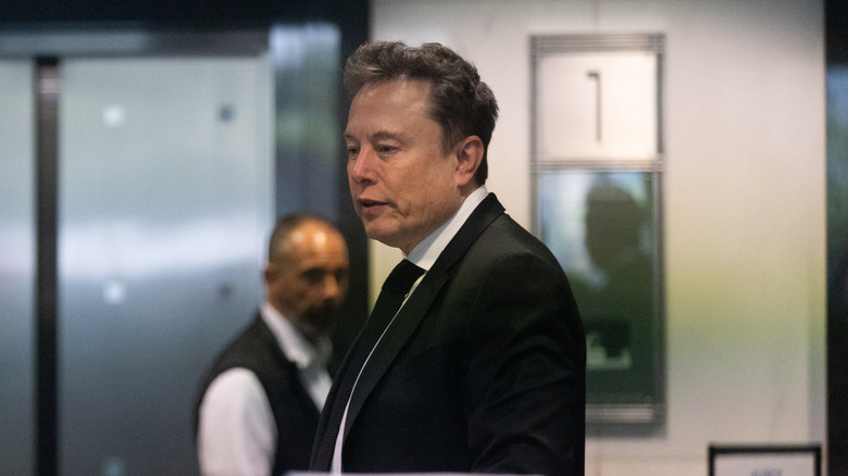 Elon Musk arrives to court for his lawsuit against OpenAI at the Ronald V. Dellums Federal Building on April 28, 2026 in Oakland, California.