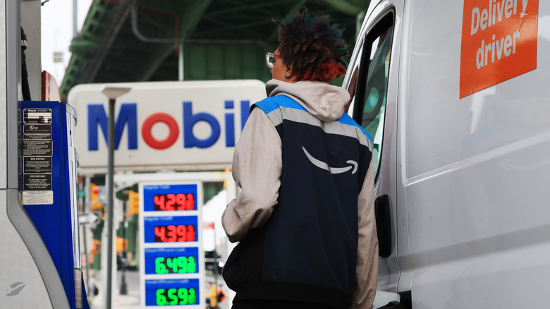 A man fills a van up with gas at a Brooklyn gas station on April 28, 2026 in New York City.