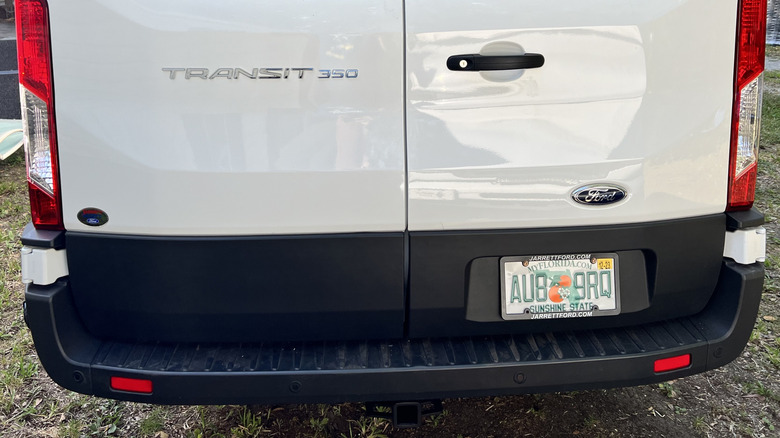 A Florida license plate with a frame covering non-essential parts of it, which is now illegal