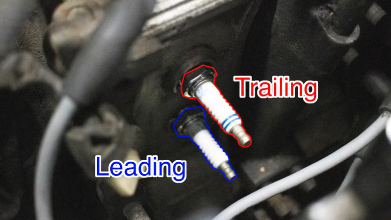 Leading and trailing spark plugs in a Mazda 13B rotary engine