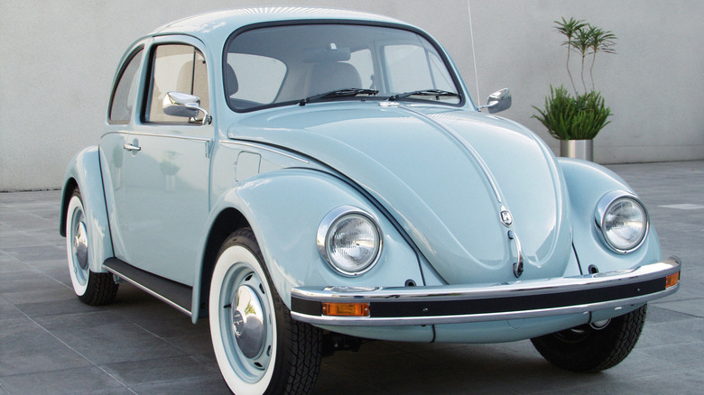 Light blue VW Beetle front 3/4 view