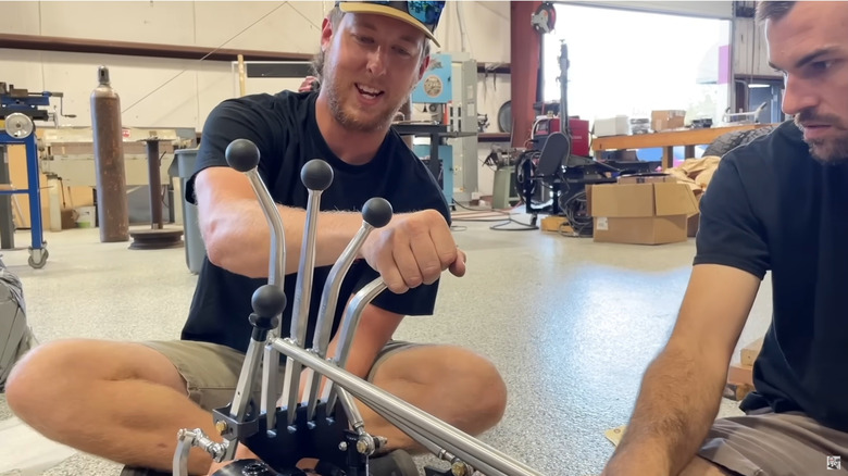 YouTuber Cleetus McFarland tests his Lenco transmission as it sits in his shop