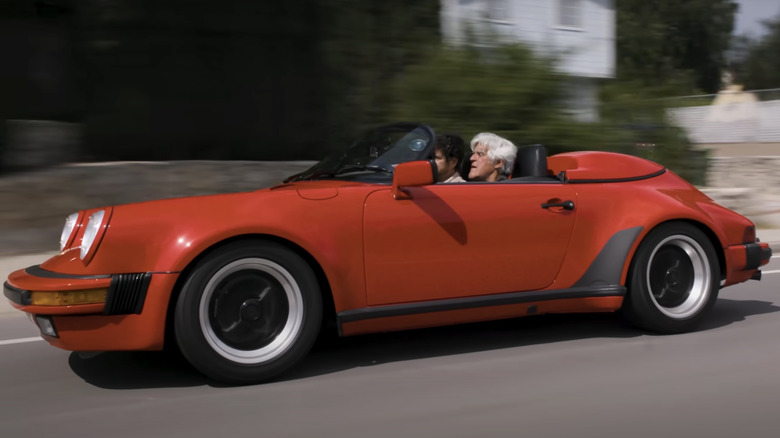Jay Leno driving a 1989 Porsche Speedster