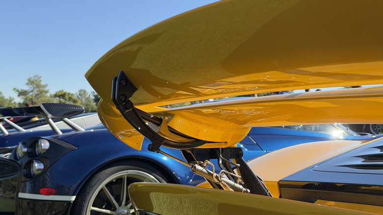 Rear wing mechanism of a yellow Mercedes-AMG One