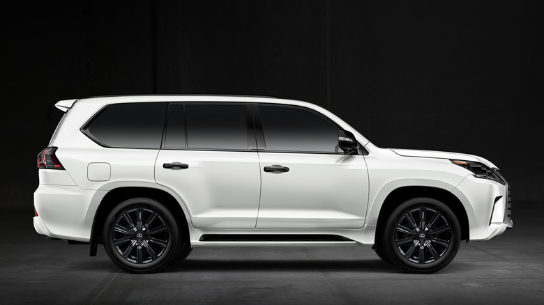 A side shot of a while 2021 Lexus LX 570
