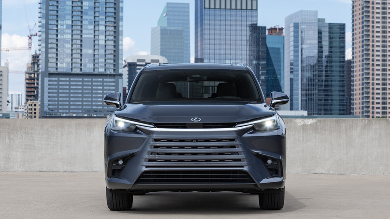 A head-on shot of a gray-blue 2024 Lexus TX