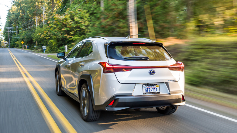 A dynamic rear shot of silver Lexus UX250h