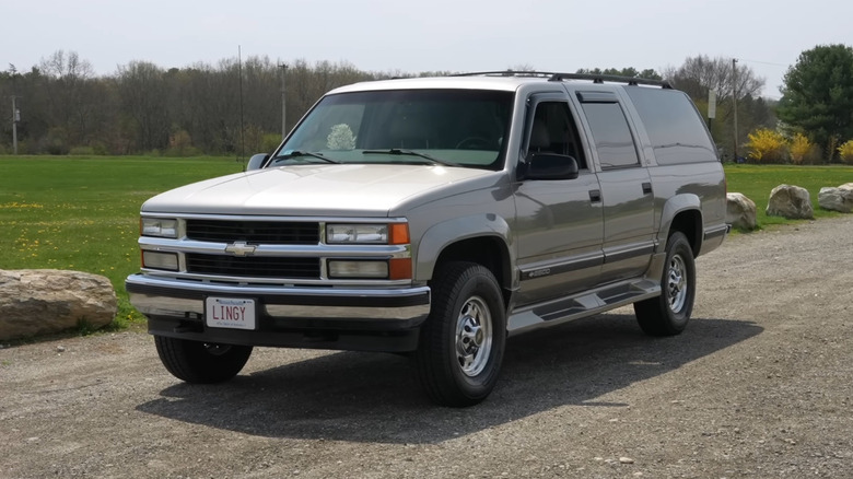A golden color 1999 Lingenfelter Suburban