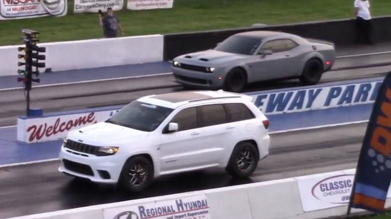 A Jeep Grand Cherokee Trackhawk staging for a drag race