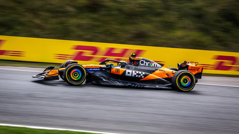 An F1 car during a race from a side-view