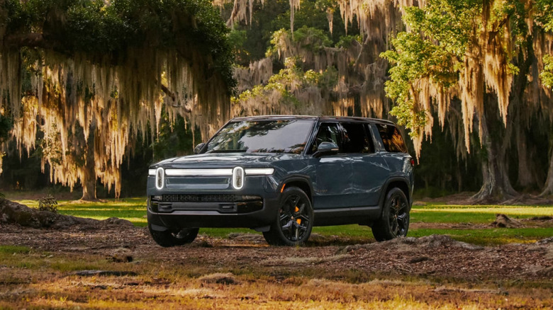 2026 Rivian R1S in a dark forest