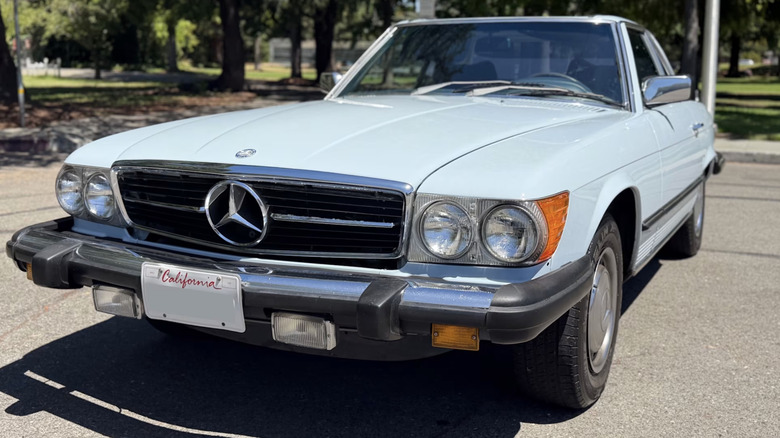 a 1977 Mercedes-Benz 450SL Convertible in baby blue