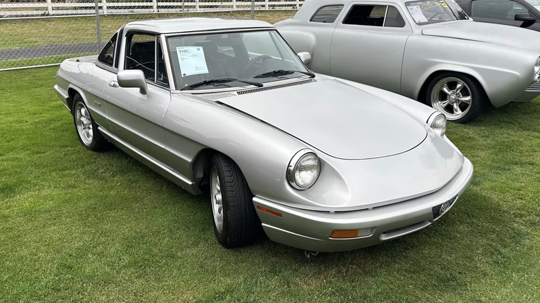 a silver 1991 Alfa Romeo Spider $3,500