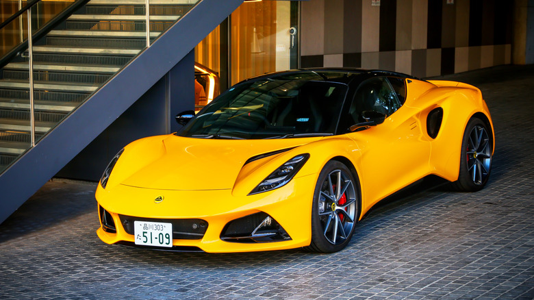 Lotus Emira stationary in yellow.
