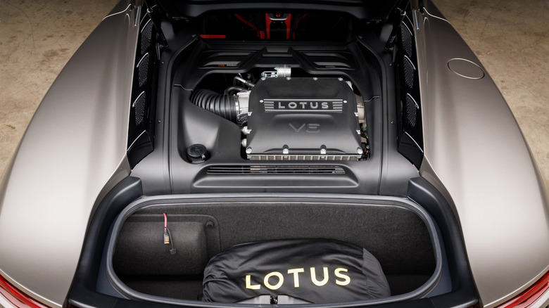 Lotus Emira engine cover open, showing its V6.