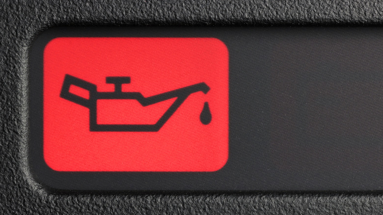 Illuminated oil pressure warning light on the instrumentation.