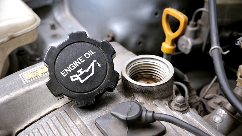 An open engine oil filler cap.