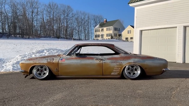airbagged Chevrolet Corvair in the snow