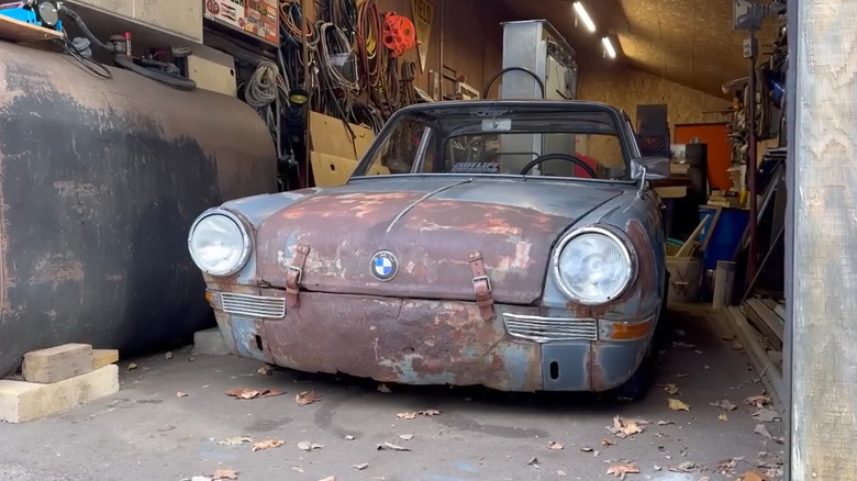 BMW 700 on airbags parked in a garage