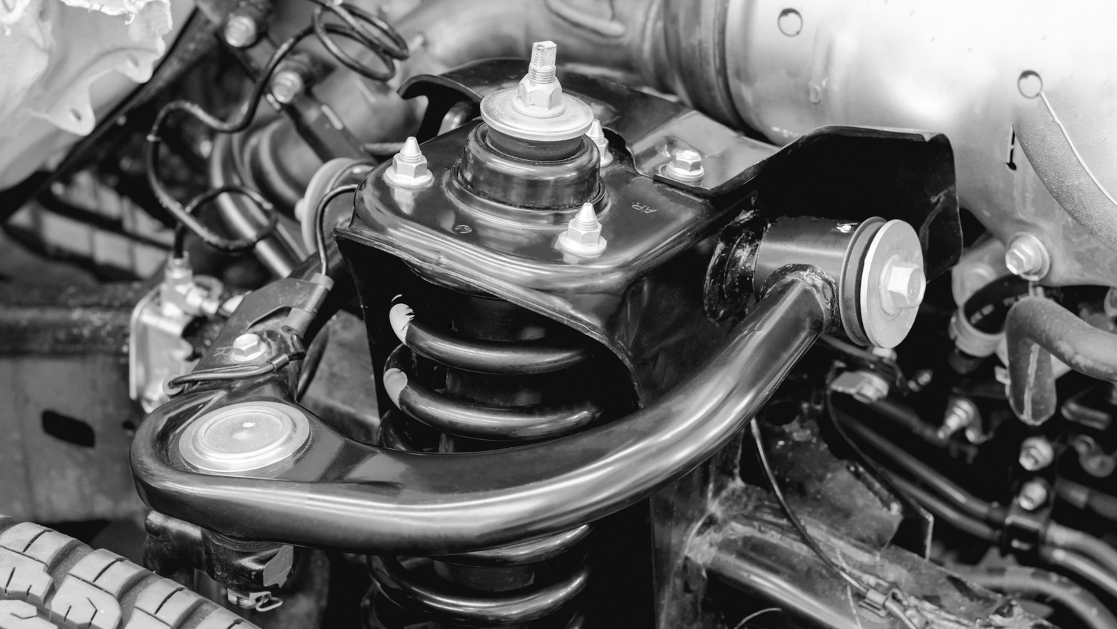 MacPherson Struts Vs. Double Wishbone: How Do The Suspension Designs Compare?