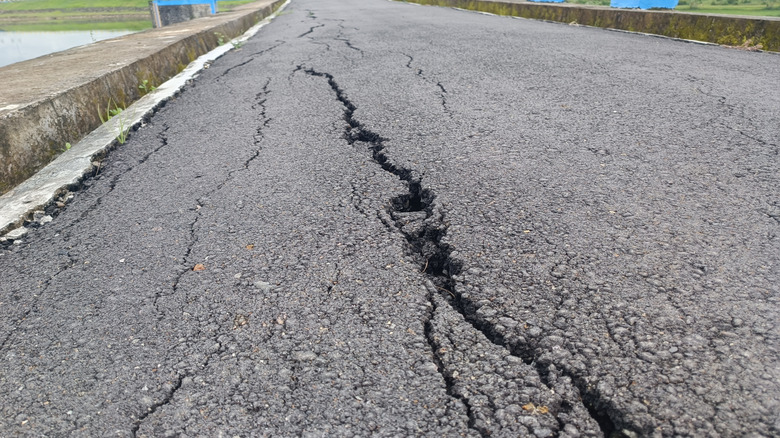 Cracked asphalt on a bridge