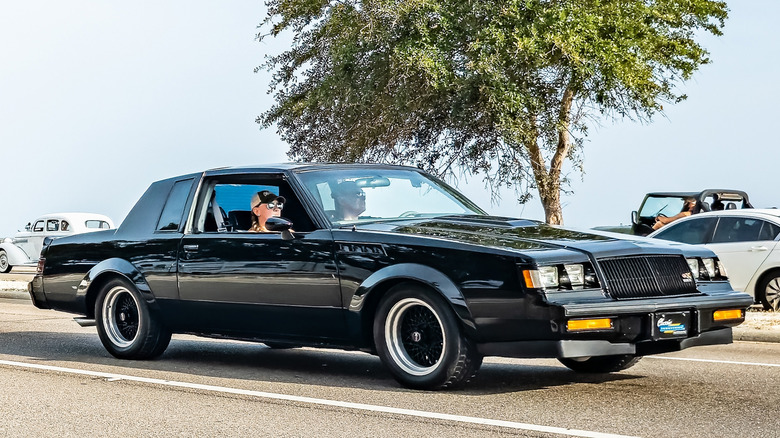 Wide angle front corner view of a 1987 Buick Grand National Regal GNX Hardtop at a local car show.