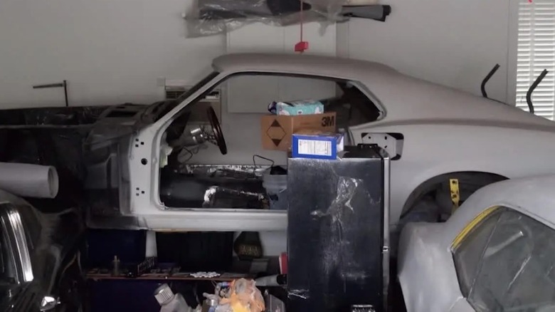 Side view of Kevin Bickley's 1969 Ford Mustang Mach 1 sitting unfinished at Miller's Performance and Restoration