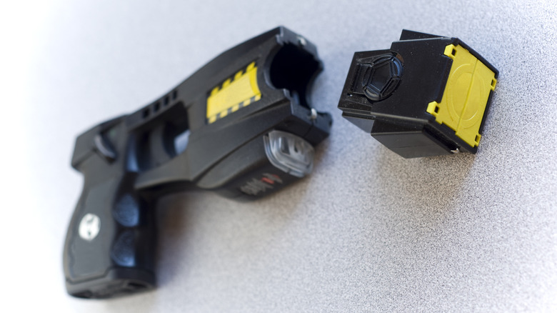A taser with the cartridge beside it
