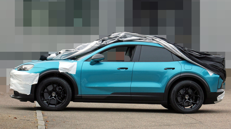 Side view of a Miami Blue Porsche Cayenne Turbo GT Electric prototype