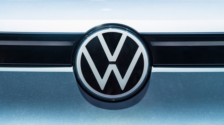 Volkswagen id4 emblem on car. vw logo and electric car icon. Volkswagen Electric Car shows its emblem at Shanghai Auto Show.China, Shanghai, May 2, 2025.