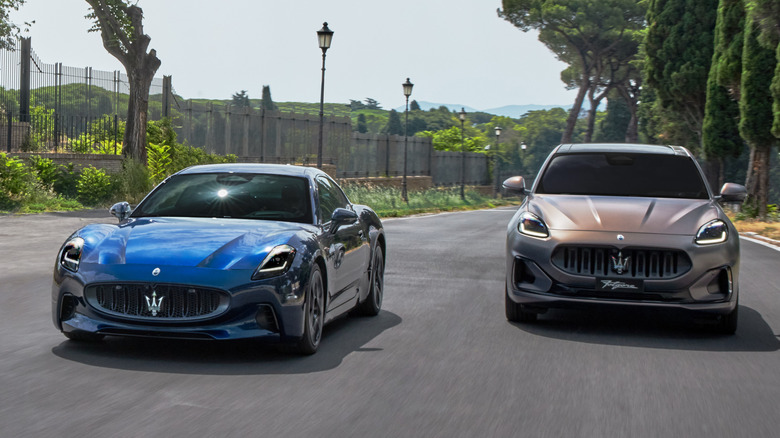 Front three quarters shot of a rose gold Maserati GranCabrio Folgore in a photo studio in front of a background that looks like a dusky night sky